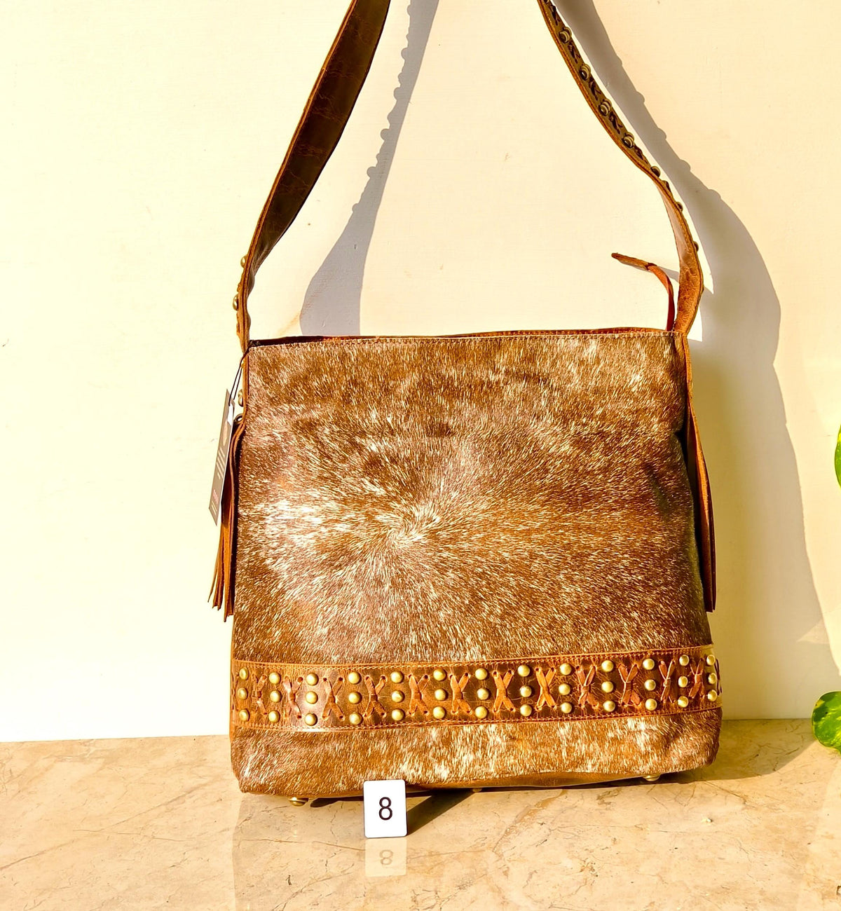 Cowhide Shoulder Bag – Western Leather Handbag with Studded Detail, Handmade Leather Strap & Tassels - JayKayBoutiqueOnline