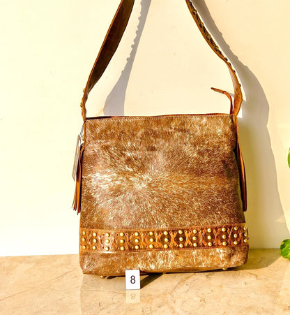 Cowhide Shoulder Bag – Western Leather Handbag with Studded Detail, Handmade Leather Strap & Tassels - JayKayBoutiqueOnline