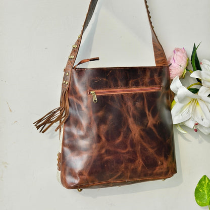 Cowhide Shoulder Bag – Western Leather Handbag with Studded Detail, Handmade Leather Strap & Tassels - JayKayBoutiqueOnline