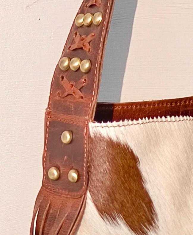 Cowhide Shoulder Bag – Western Leather Handbag with Studded Detail, Handmade Leather Strap & Tassels - JayKayBoutiqueOnline
